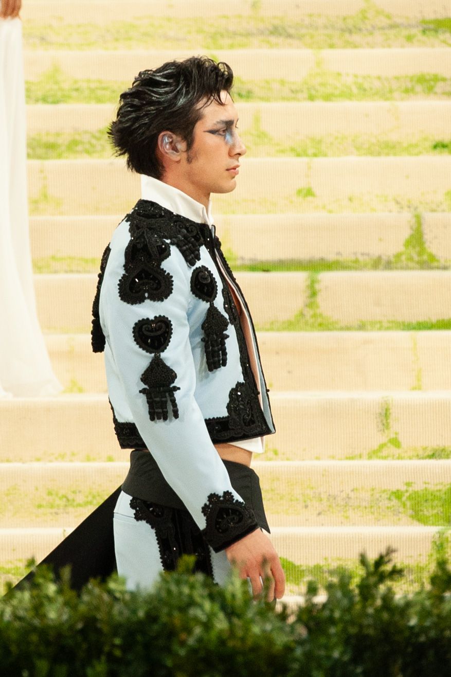 Hudson Williams at the 2026 Met Gala, wearing fashion in theme of "Costume Art"