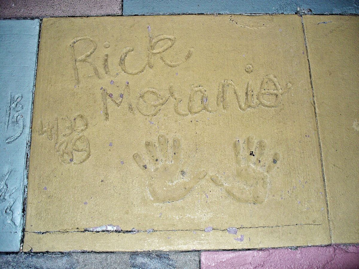 The handprints of Rick Moranis in front of The Great Movie Ride at Walt Disney World's Disney's Hollywood Studios theme park.
