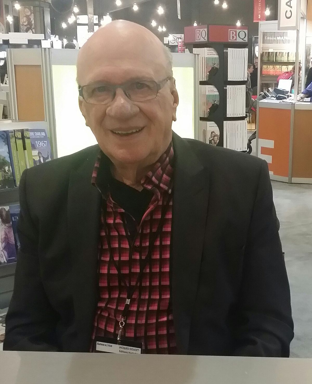 Jacques Doucet photographed photographed in Montréal , Québec, Canada at the Salon du livre de Montréal 2018.