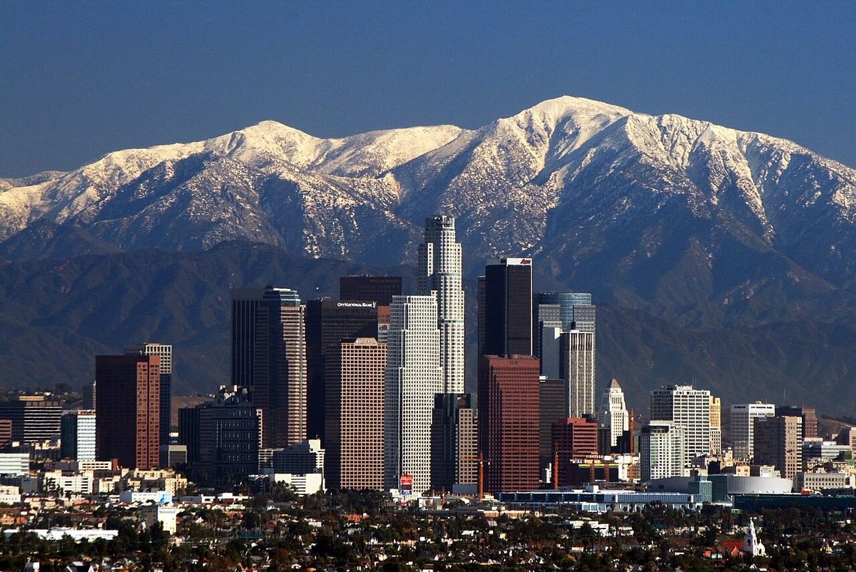 Los Angeles skyline and San Gabriel mountains.