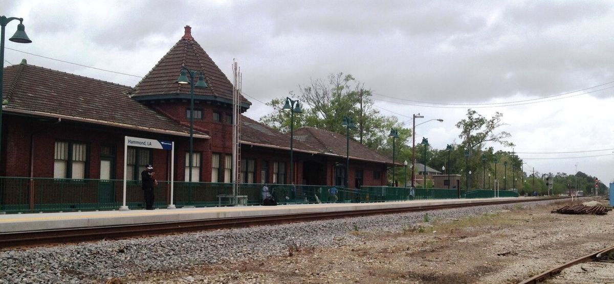Historic railway depot in Hammond, Louisiana, with modern elevated passenger platform. View is toward the North on the Canadian National Rai