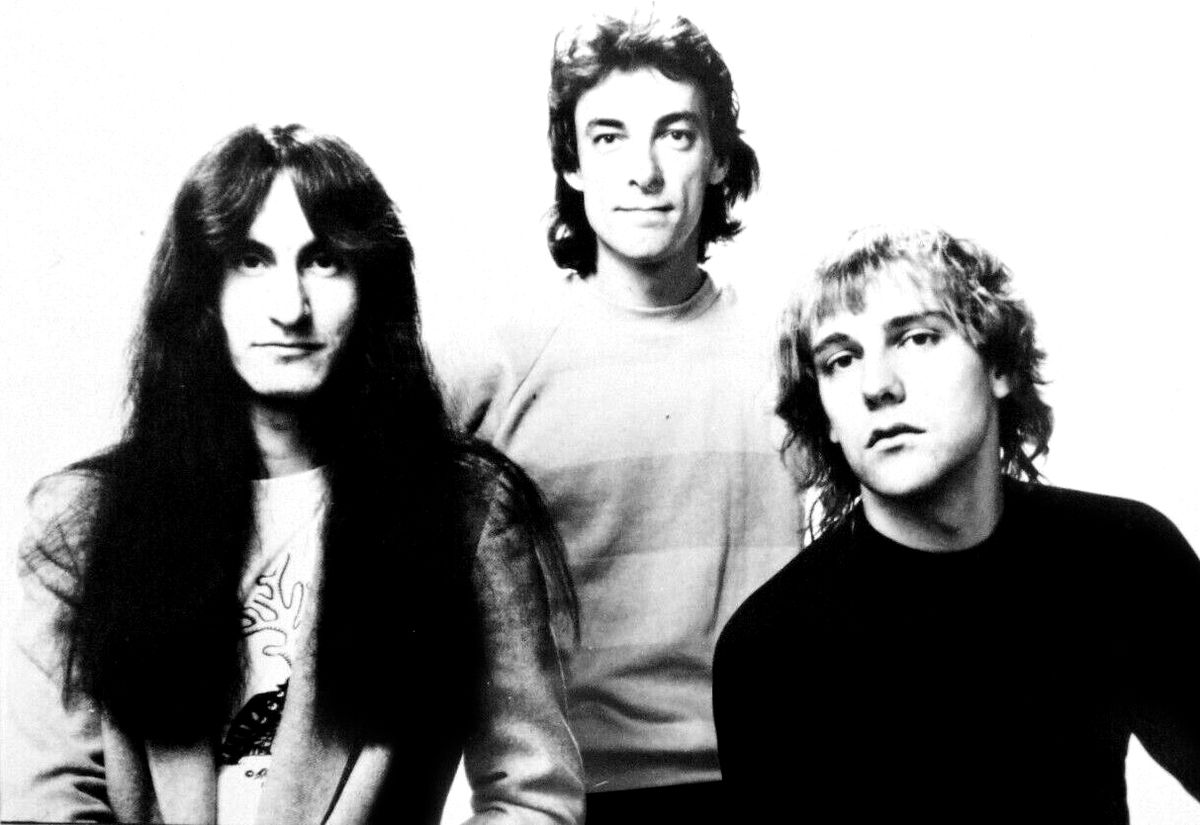 Promotional press photo of Canadian rock band Rush.