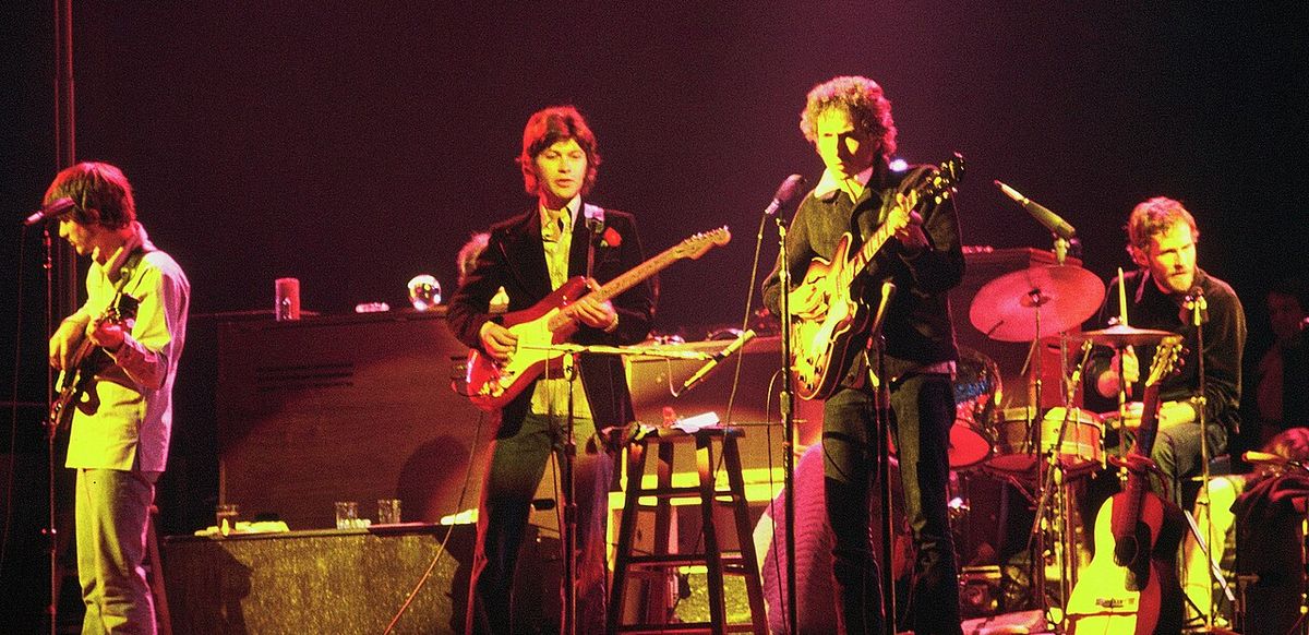 Bob Dylan and The Band touring in Chicago, 1974 (Left to right: Rick Danko (bass), Robbie Robertson (guitar), Bob Dylan (guitar), Levon Helm