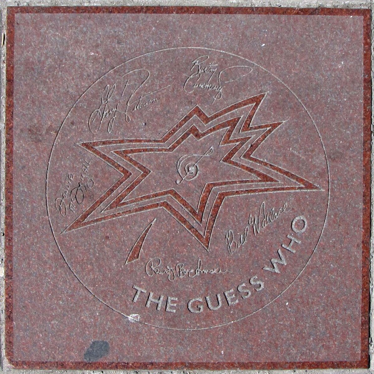 Star on Canada's Walk of Fame for the rock band The Guess Who. Signatures, from top left clockwise: Garry Peterson, Burton Cummings, Bill Wa